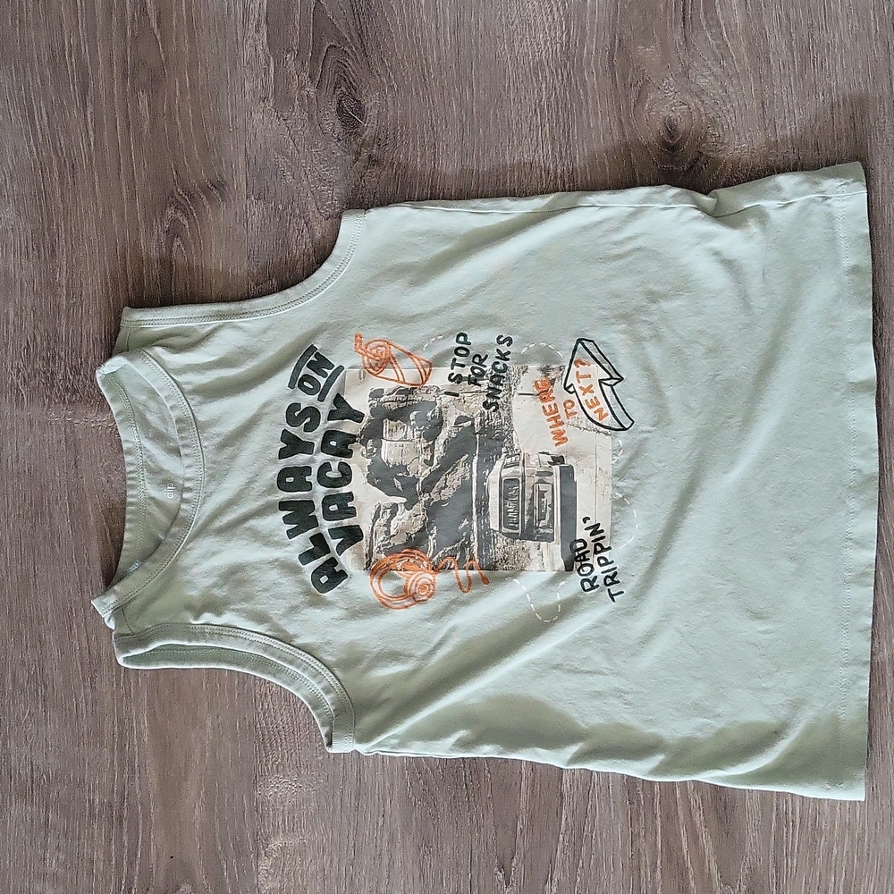 Tank top dip(fred Meyers brand) color is a light green, size M